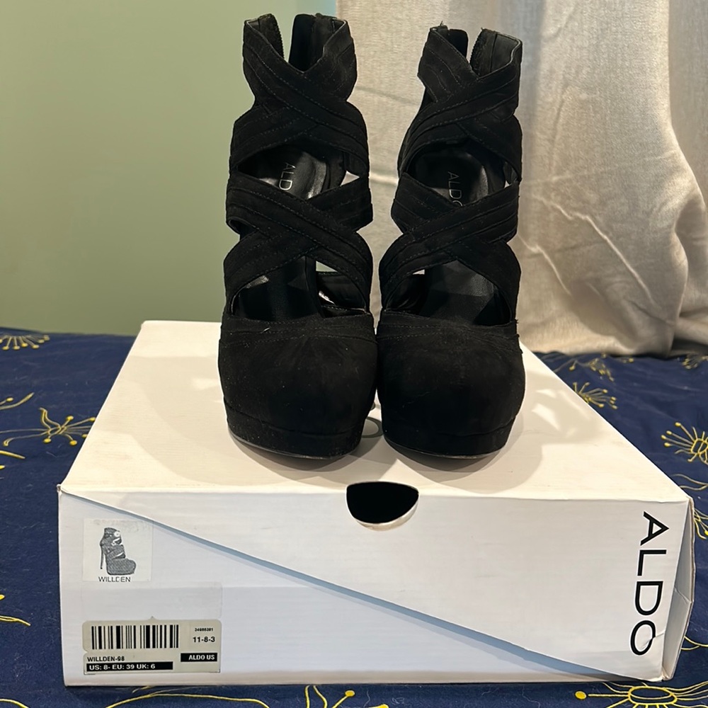 High heel black suede shoes with back zipper. Worn once